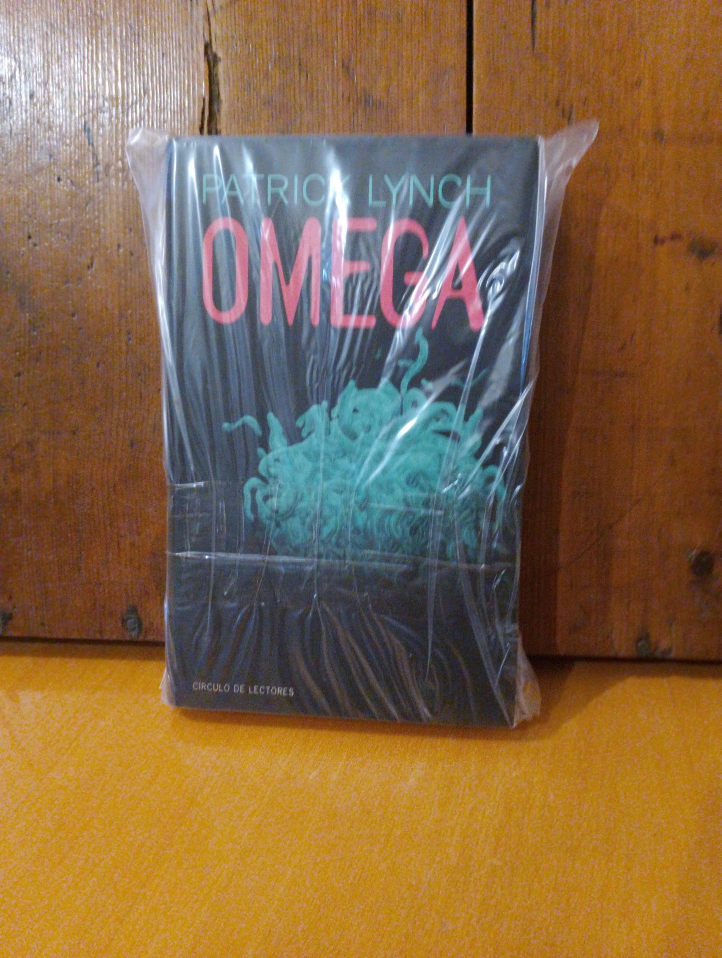 Omega. Patrick Lynch